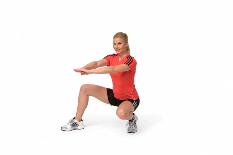 Duck Walk: Arms-forward variation shown. The book specifies hands behind the head, elbows out, and an upward gaze.