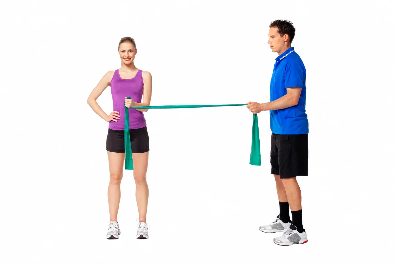 Internal shoulder rotation toward the abdomen with the elbow beside the trunk and the coach holding the band.