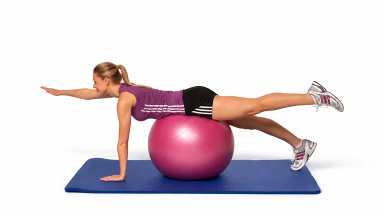 Alternating contralateral raise: one hand and the opposite foot remain supported while the other diagonal pair lifts.
