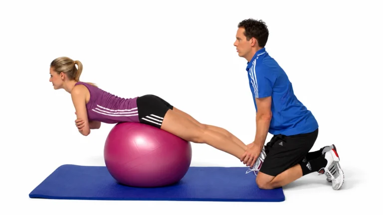 Coach-stabilized trunk-extension reference. Use the selected trunk range without forcing the head backward.